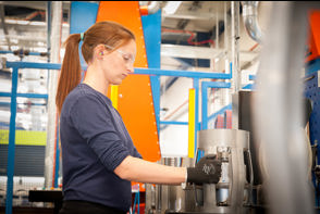 S2 centralizers being inspected by production operative